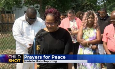 Community and church leaders gather in Minneapolis on July 11 after a 3-year-old was shot while playing outside two days earlier.