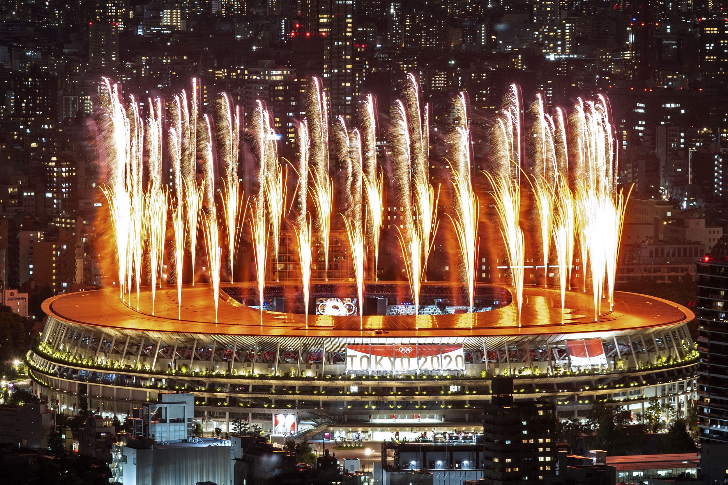 Fireworks light up the sky over the Olympic Stadium during the opening ceremony of the Tokyo 2020 Olympic Games, in Tokyo, on July 23, 2021. (Photo by Charly TRIBALLEAU / AFP) (Photo by CHARLY TRIBALLEAU/AFP via Getty Images)