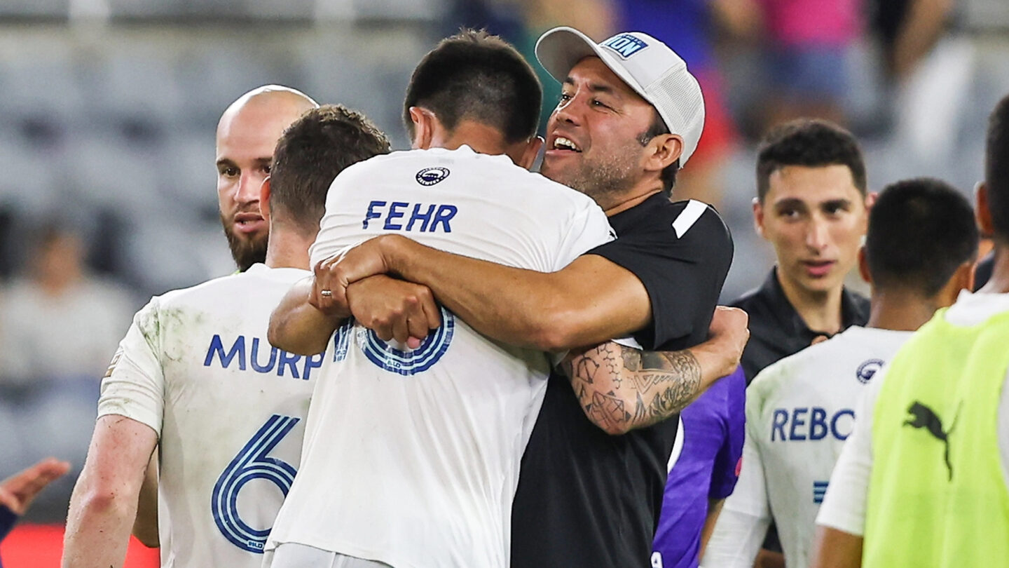 Mobi Fehr and Monterey Bay F.C. coach Ramiro Corrales celebrate after goal puts F.C. up 1-0