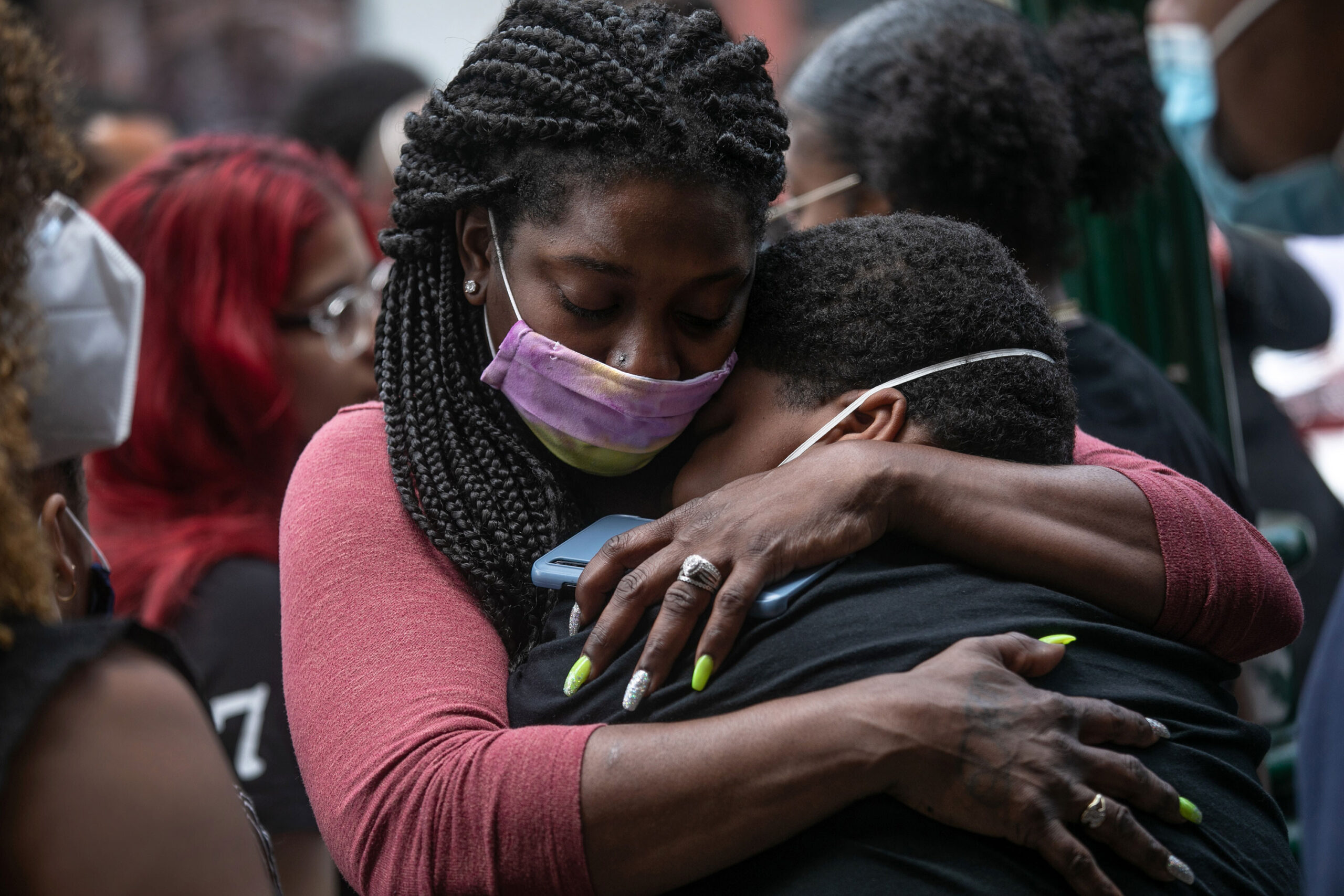 <i>John Moore/Getty Images)</i><br/>Friends and family mourn the death of Conrad Coleman Jr. following his funeral service on July 3