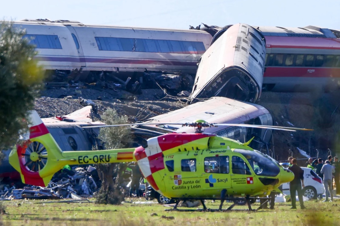 <i>Manu Fernandez/AP via CNN Newsource</i><br/>Emergency services work at the scene of a collision between two trains in Urda