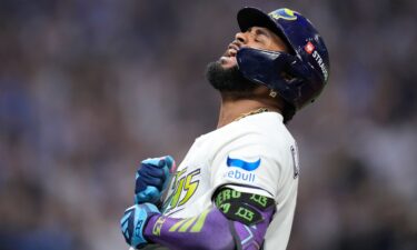 Tampa Bay Rays' Junior Caminero celebrates his seventh-inning home run that sealed a trip to the World Series for his team.