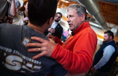 Democratic candidate for US Senate Sherrod Brown talks with voters during a campaign event at Fifty West Brewing Company in Chillicothe