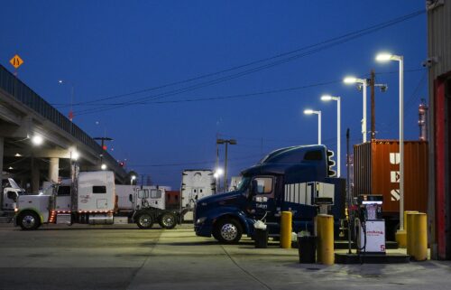 A truck is parked at a diesel fuel pump displaying prices above $8 per gallon at a truck stop in the Wilmington neighborhood of Los Angeles on September 22