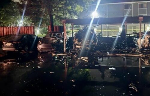 Nearly two dozen vehicles were damaged and a carport was destroyed following a fire at a San Jose housing complex early Friday morning.